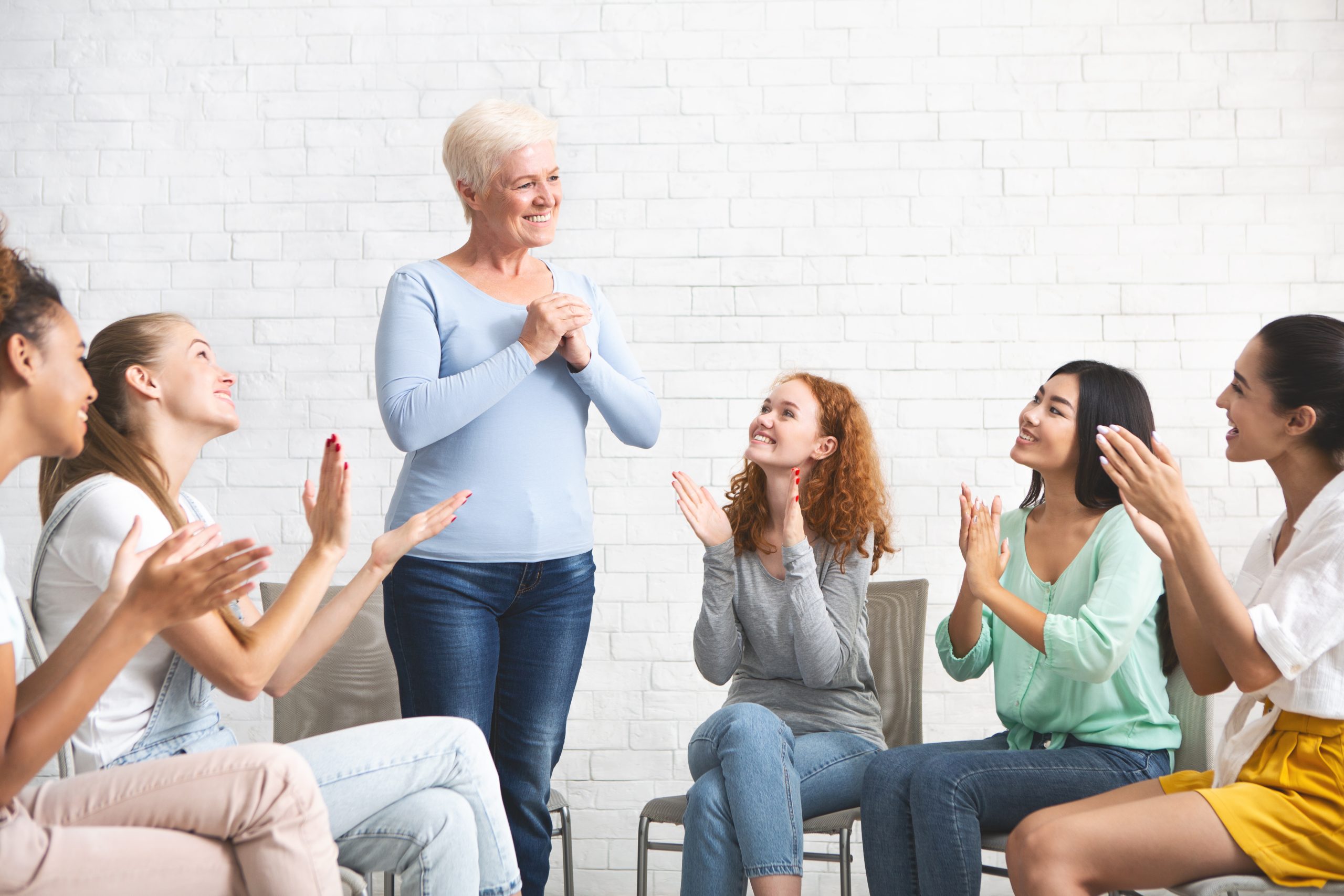 Woman Expressing Gratitude For Psychological Help During Group Therapy Indoors Group Psychotherapy Concept. Mature Woman Expressing Gratitude For Psychological Help And Support During Group Therapy Indoors. Selective Focus