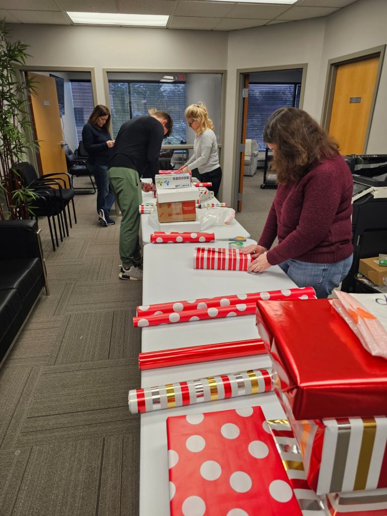 people wrapping gifts