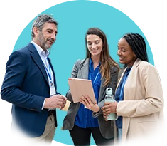 3 people looking at notepad