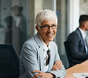 woman crossing arms wearing glasses