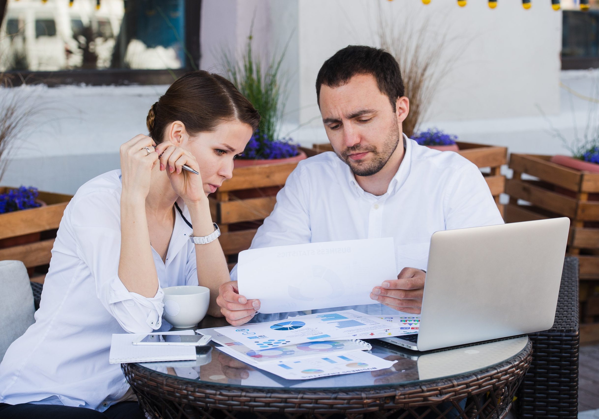 business people conflict working problem, angry boss argue scream to colleague businessmen and women serious argument negative emotion discussing report meeting at outdoors cafe during the lunch break two business people working out conflict